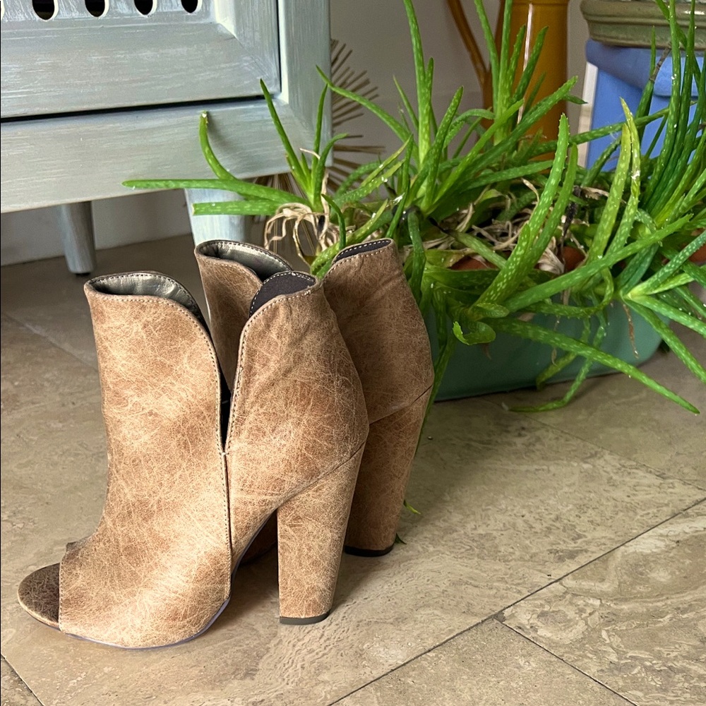 Michael Antonio peep toe booties.